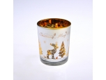 Glass candle holder with Christmas decoration
