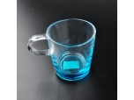 Glass mug with exterior color spray